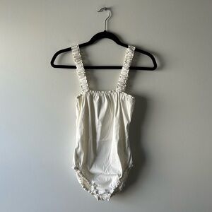 Dusica Kotur Sacks white bodysuit